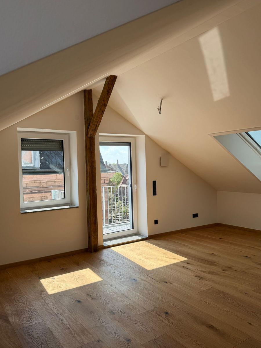 Ausgebautes Dachgeschoss mit Sichtbalken